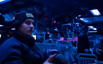 Sailors Stand Watch Aboard USS Dewey, April 9