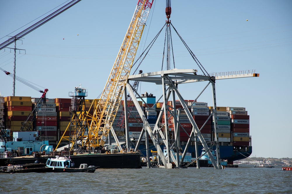 Key Bridge Response 2024 Unified Command salvors move a large piece of supporting steel from the collapsed Francis Scott Key Bridge.