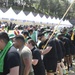 U.S. service members participate in the annual Gijisi Tug-of-War Festival