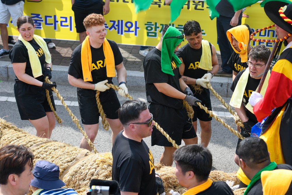 U.S. service members participate in the annual Gijisi Tug-of-War Festival