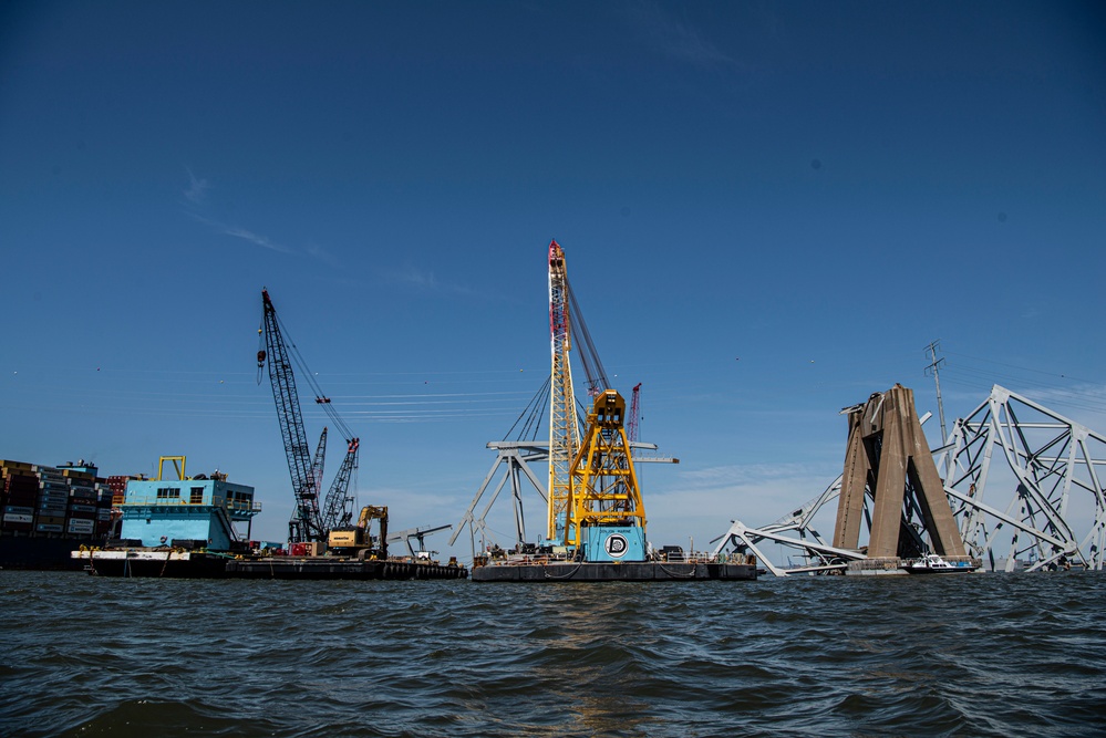 Salvors remove a large portion of bridge blocking the Fort McHenry channel