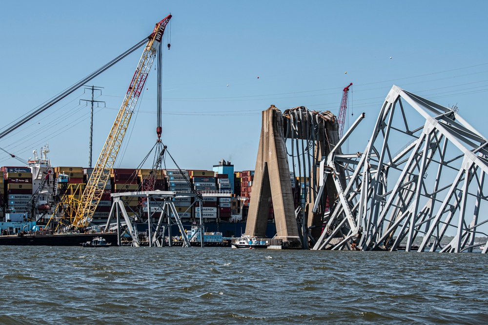 Salvors remove a large portion of bridge blocking the Fort McHenry channel