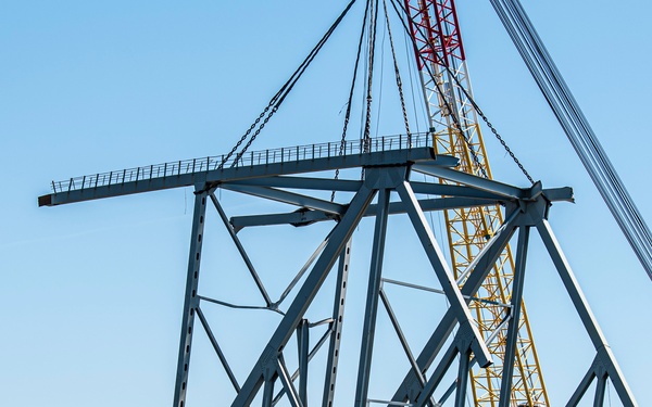 Salvors remove a large portion of bridge blocking the Fort McHenry channel