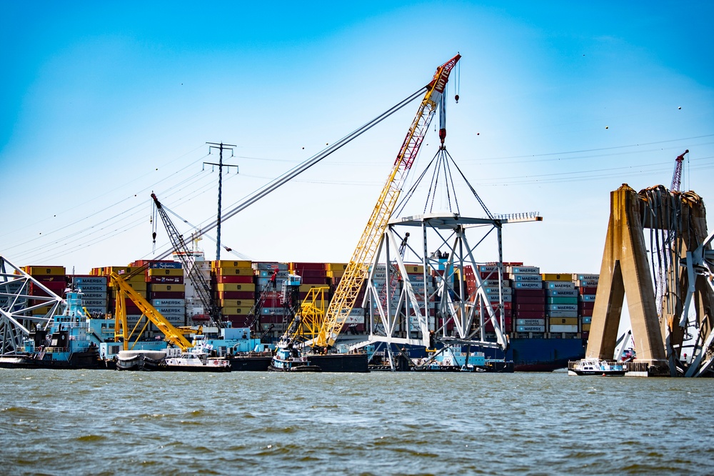 Salvors remove a large portion of bridge blocking the Fort McHenry channel