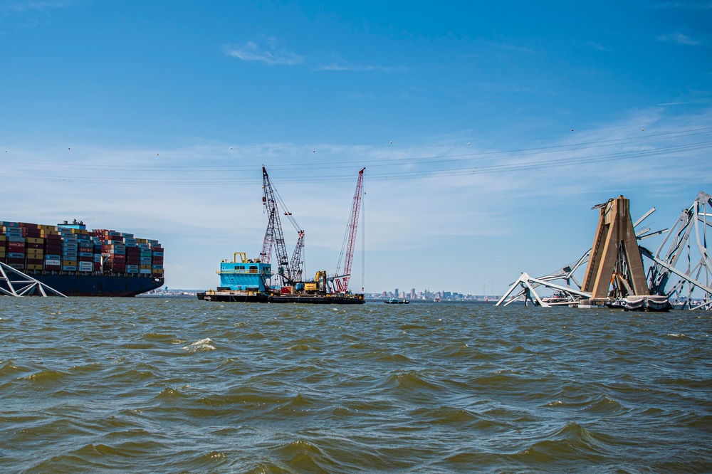 Salvors remove a large portion of bridge blocking the Fort McHenry channel