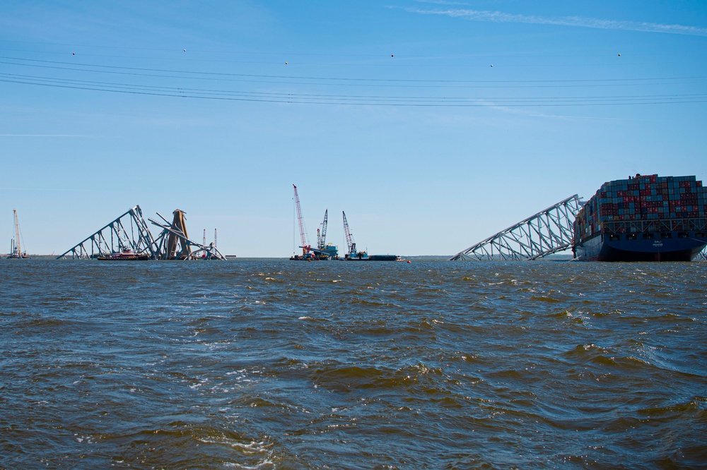 Salvors remove a large portion of bridge blocking the Fort McHenry channel