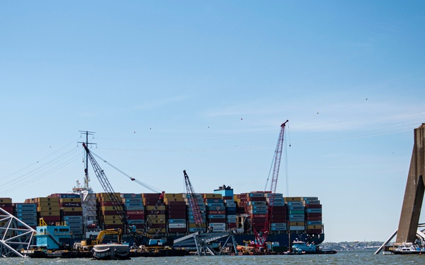 Salvors remove a large portion of bridge blocking the Fort McHenry channel