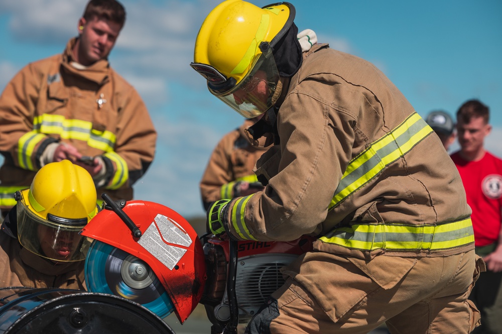 U.S. Marines participate in the Aircraft Rescue and Fire Fighter Rodeo on Marine Corps Base Quantico