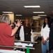 Two-time Superbowl Champion Vince Wilfork, his wife Yunka Wilfork, and country music artist, Mickey Guyton Visit Walter Reed's Warriors