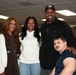 Two-time Superbowl Champion Vince Wilfork, his wife Yunka Wilfork, and country music artist, Mickey Guyton Visit Walter Reed's Warriors