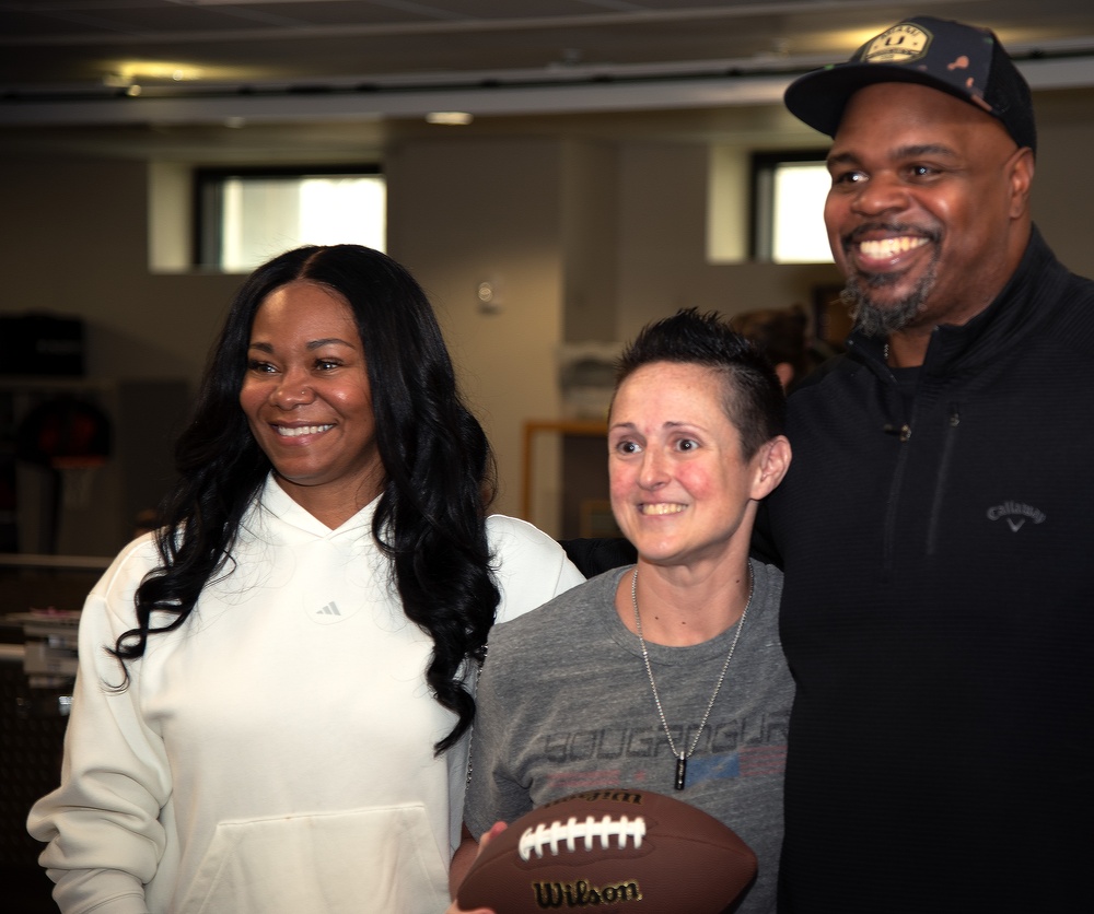 Two-time Superbowl Champion Vince Wilfork, his wife Yunka Wilfork, and country music artist, Mickey Guyton Visit Walter Reed's Warriors