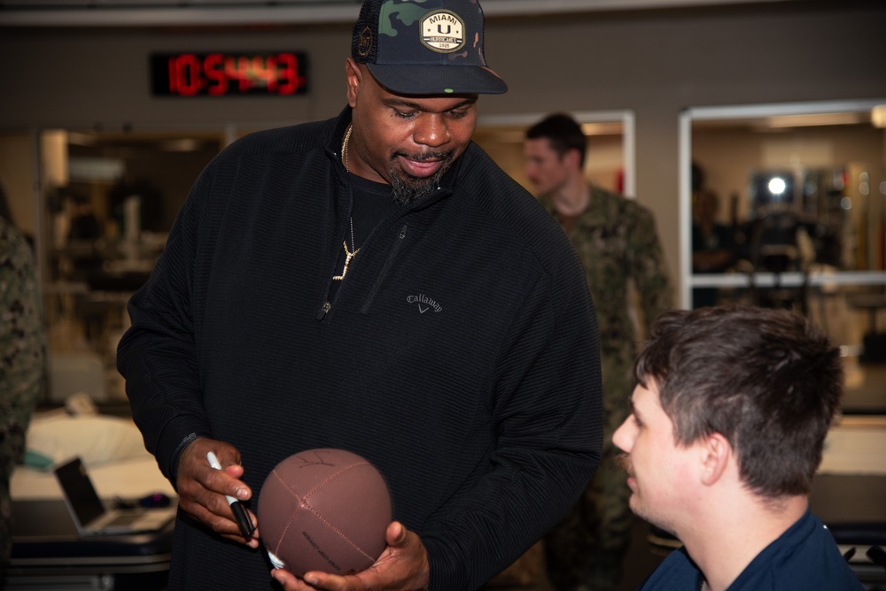 Two-time Superbowl Champion Vince Wilfork, his wife Yunka Wilfork, and country music artist, Mickey Guyton Visit Walter Reed's Warriors