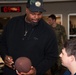 Two-time Superbowl Champion Vince Wilfork, his wife Yunka Wilfork, and country music artist, Mickey Guyton Visit Walter Reed's Warriors