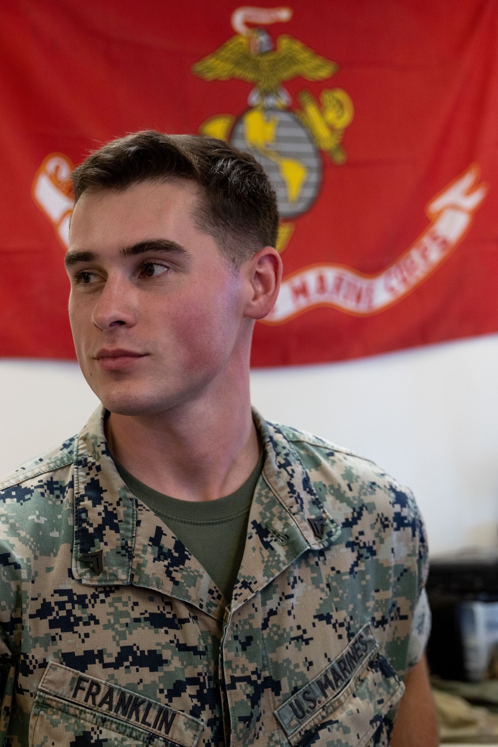 A Marine with 3d Marine Division receives the PFC Herbert A. Littleton Award recognizing his dedication to communications excellence