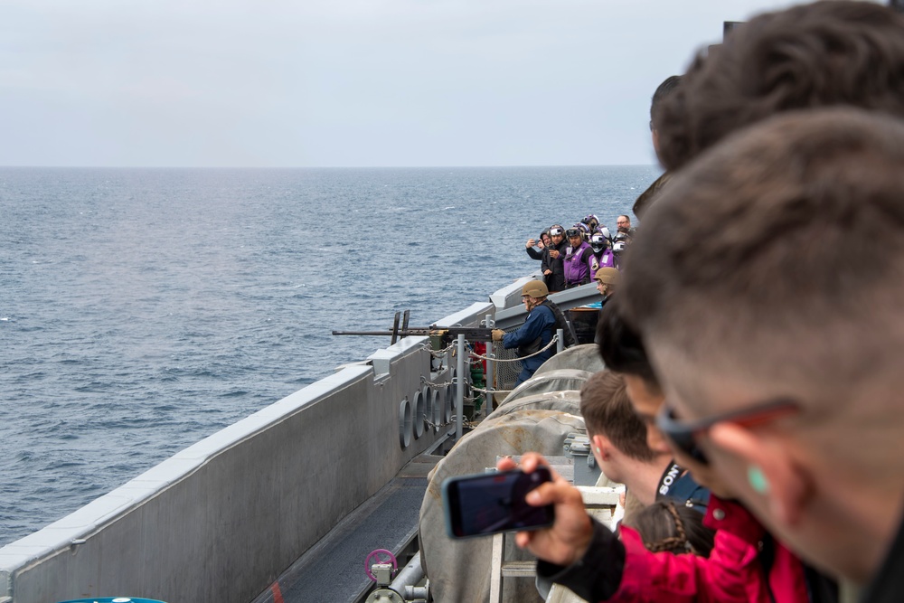 Abraham Lincoln conducts a weapons demonstration on friends and family day cruise