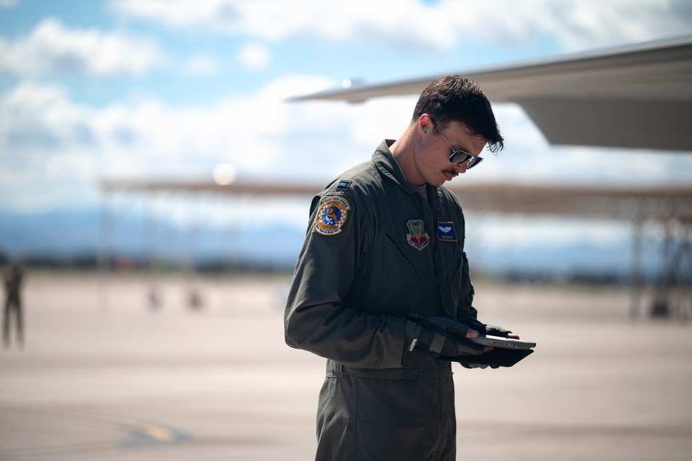 Pilots engage in independent pilot off-station procedures (IPOP) at Nellis AFB