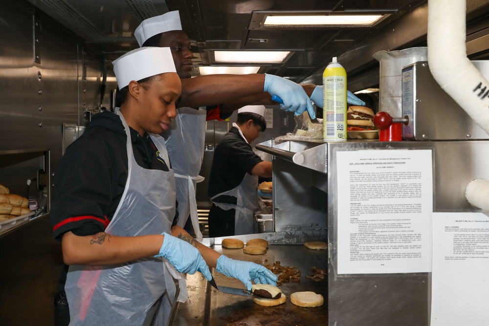 Sailors aboard the USS Howard prepare lunch for the crew in the Philippine Sea