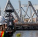 Salvage crews deconstruct wreckage removed from the Francis Scott Key Bridge