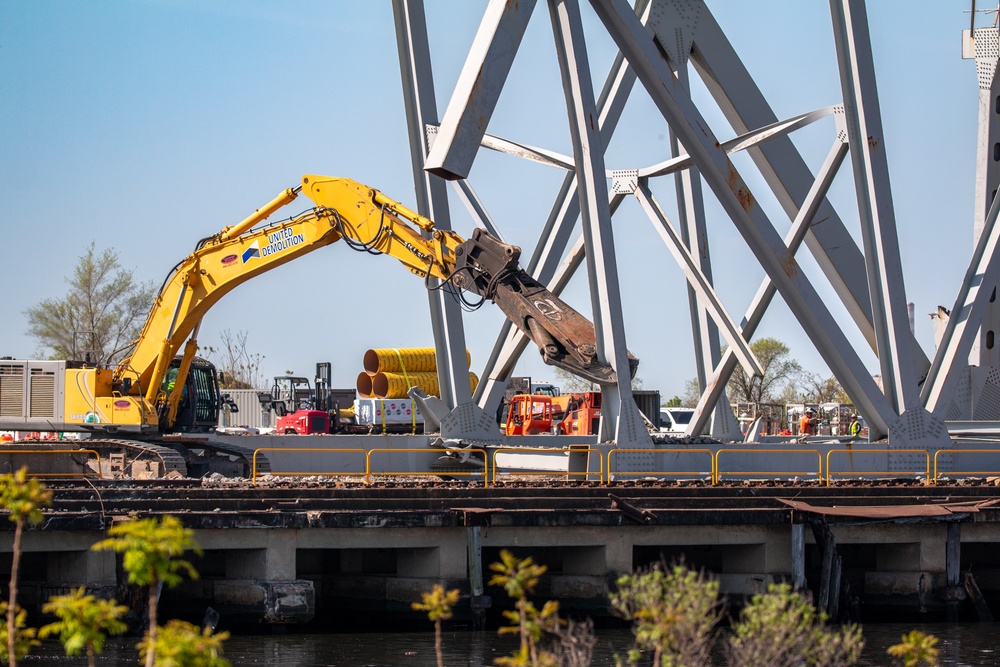 Salvage crews deconstruct wreckage removed from the Francis Scott Key Bridge