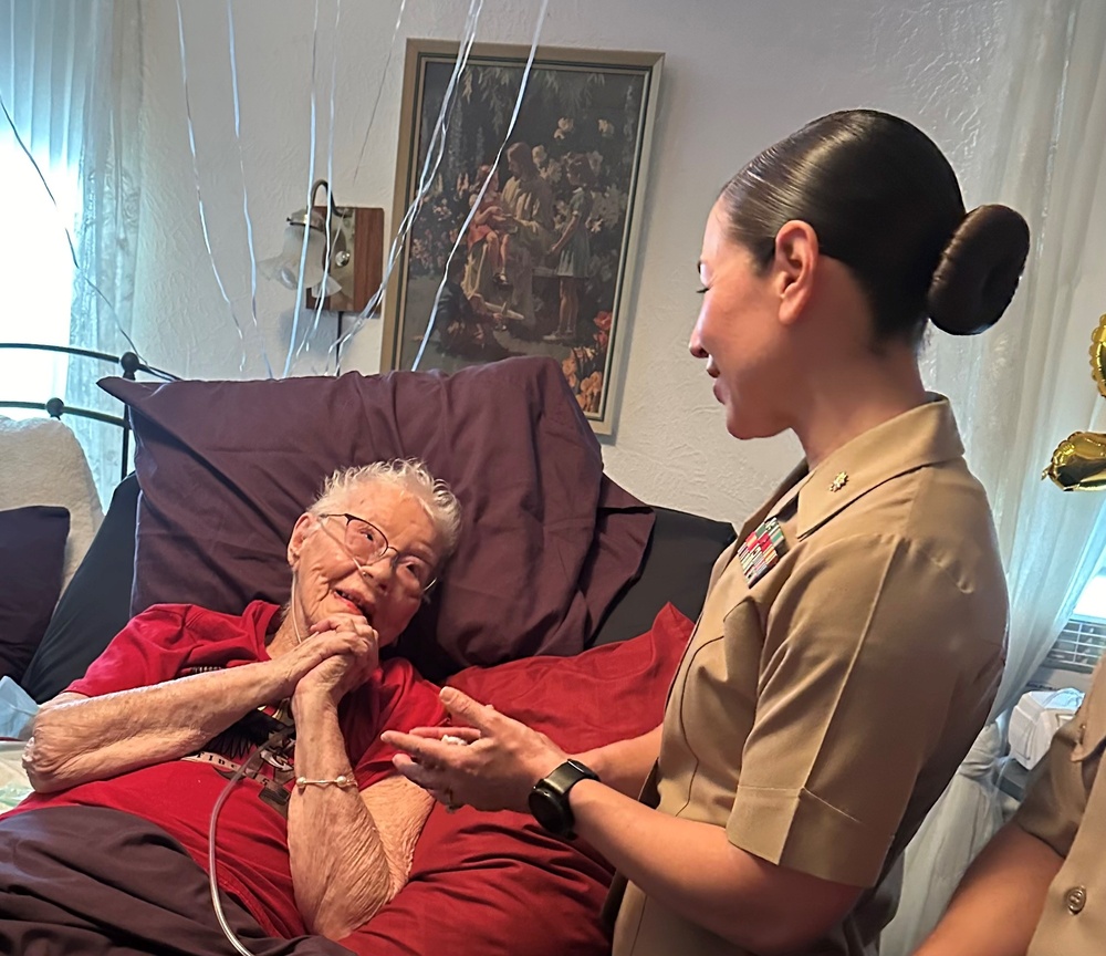 U.S. Marines celebrate retired Marine Corps Cpl. Lou 'Mama Lou' Keller's 99th birthday