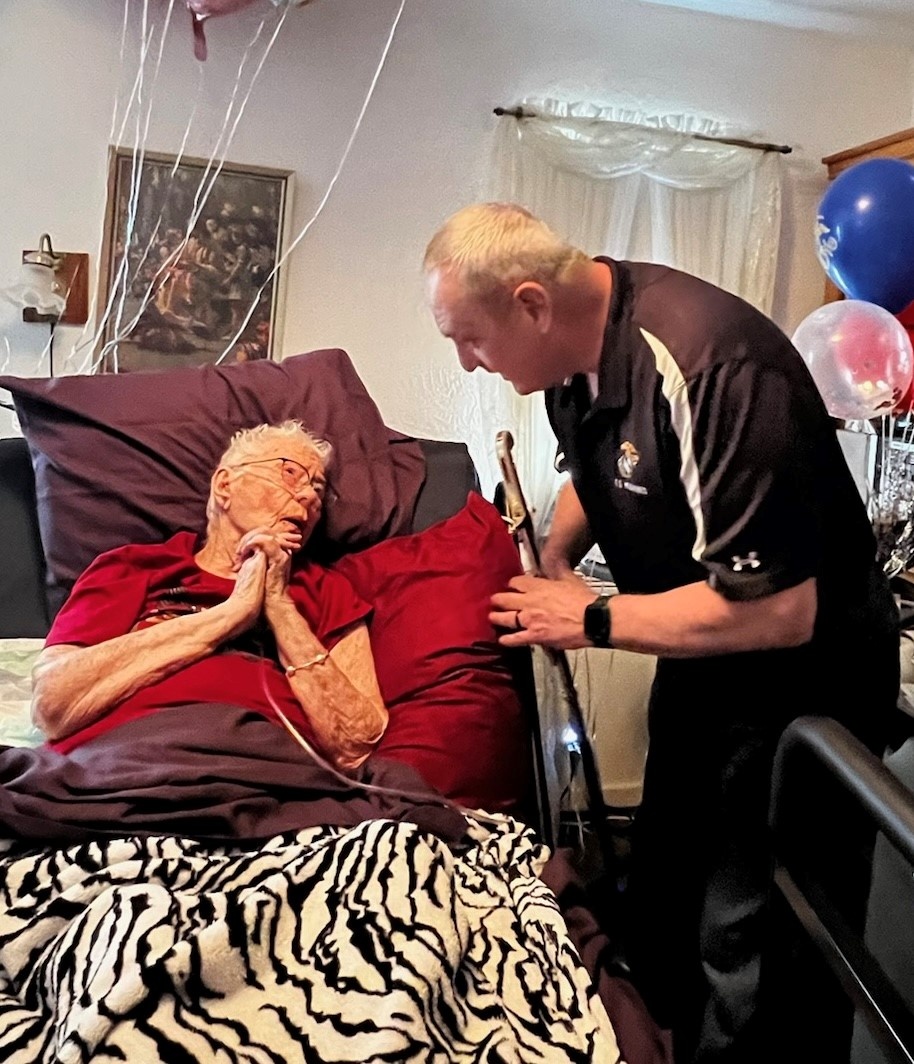 U.S. Marines celebrate retired Marine Corps Cpl. Lou 'Mama Lou' Keller's 99th birthday