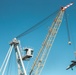 Training Aircraft Lifted Via Crane Aboard Ford