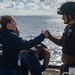 Fist bump for good luck