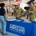 Photo of 116th Air Control Wing members working with Atlanta students in flight simulation, aerospace operations, and drone operation competition events.