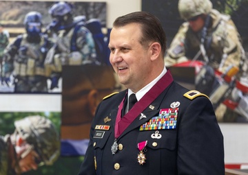 Medical Corps colonel retires at premier CBRNE command after 33 years in uniform