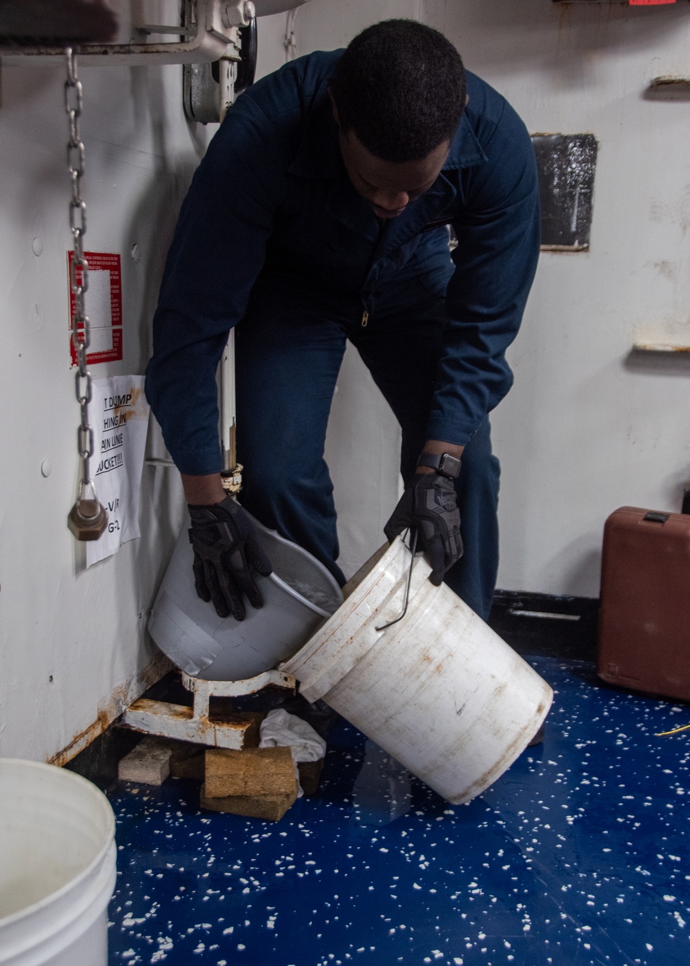 USS Ronald Reagan (CVN 76) Sailors preform maintenance on ship systems