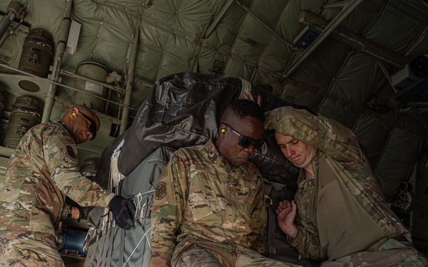 Airmen load AFCENT C-130s with humanitarian aid bound for Gaza