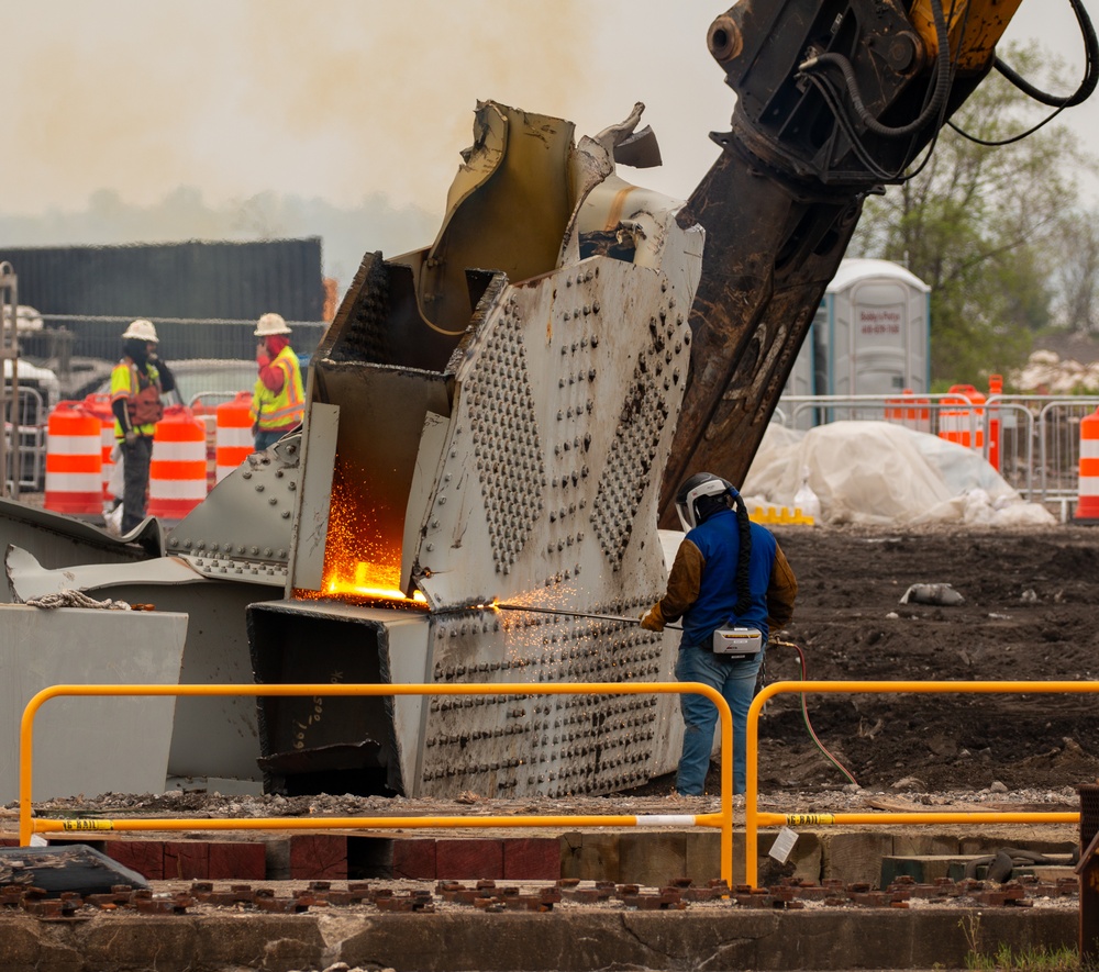 Salvage crews deconstruct wreckage removed from the Francis Scott Key Bridge