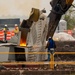 Salvage crews deconstruct wreckage removed from the Francis Scott Key Bridge