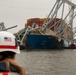 Salvage crews continue to remove wreckage from the Francis Scott Key Bridge