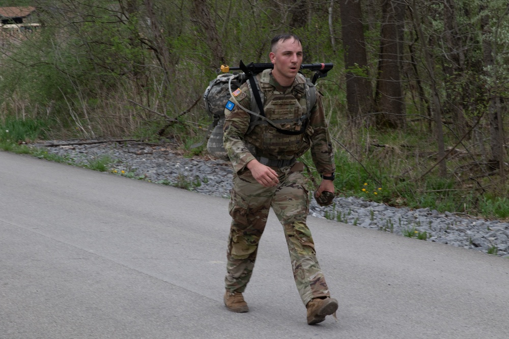 Best Warrior Competition competitors compete in a 6 mile ruck march