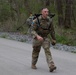 Best Warrior Competition competitors compete in a 6 mile ruck march