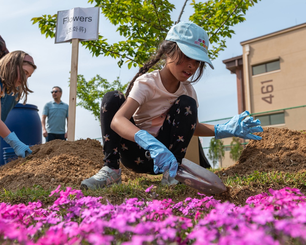 Osan Girl Scouts plant trees for earth day