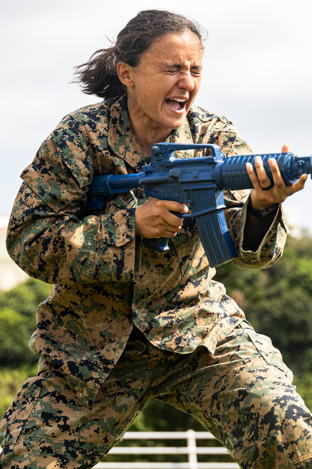 Marines endure OC spray training during MAI course