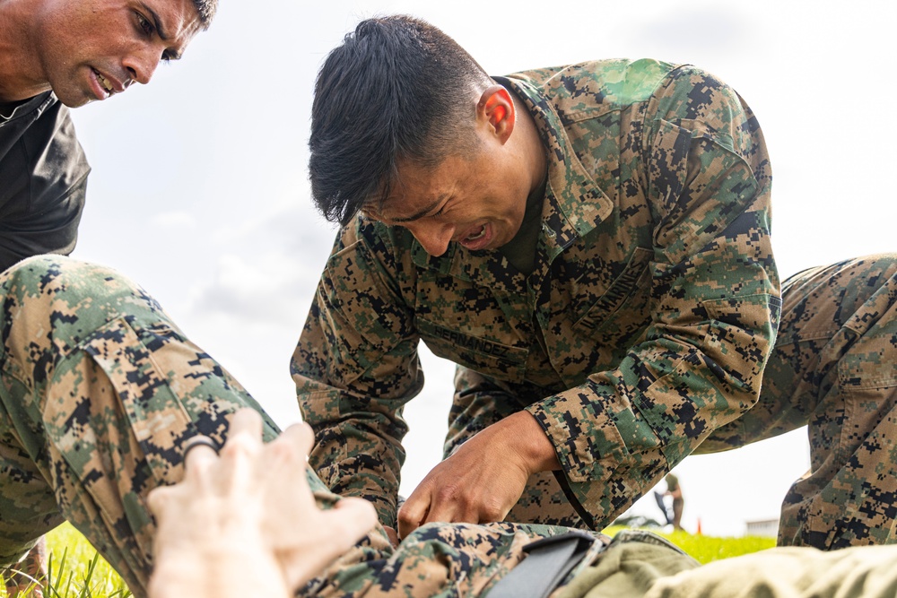 Marines endure OC spray training during MAI course