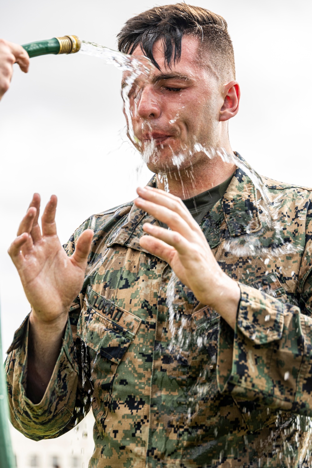 Marines endure OC spray training during MAI course