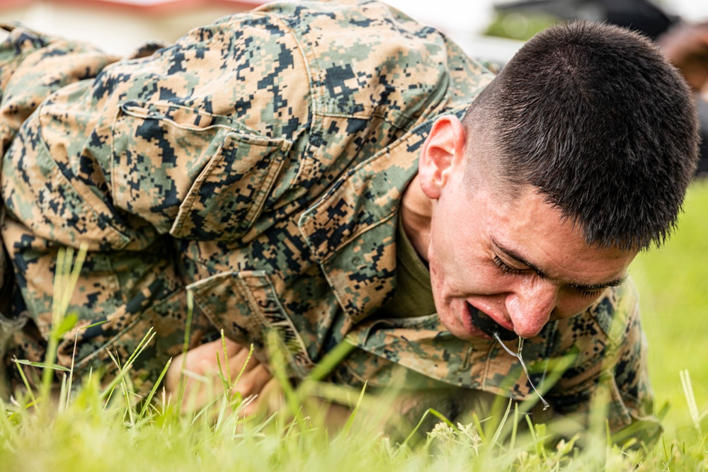 Marines endure OC spray training during MAI course