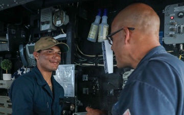 USS Leyte Gulf CO Congratulates Sailor of the Day While Underway