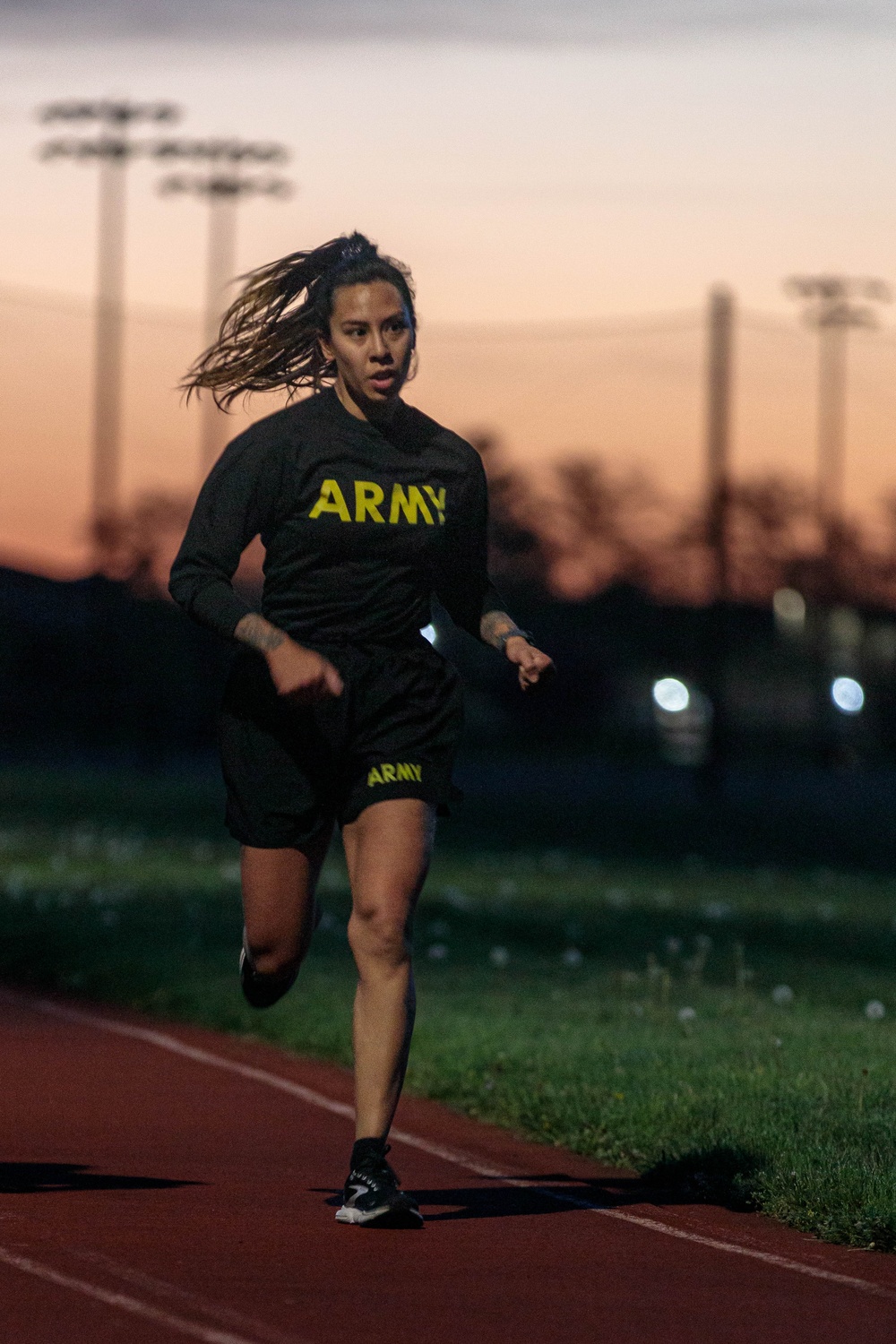 1st Lt. Jessica Romero runs at a 5-mile time trial
