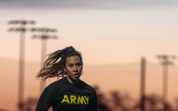 1st Lt. Jessica Romero runs at a 5-mile time trial