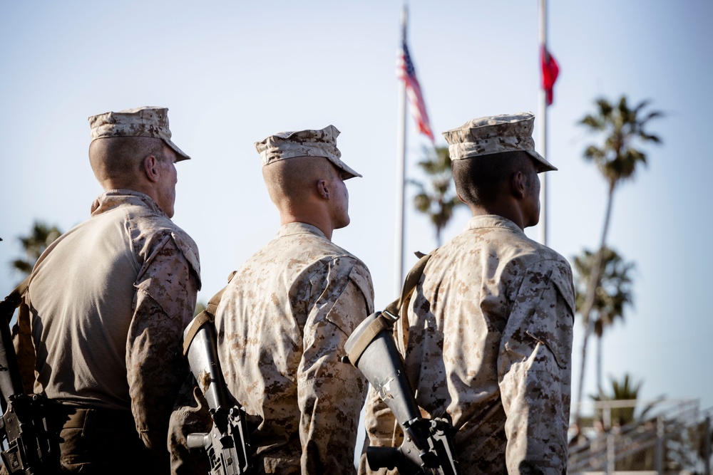 Marines with Alpha Company receive their Eagle, Globe and Anchors