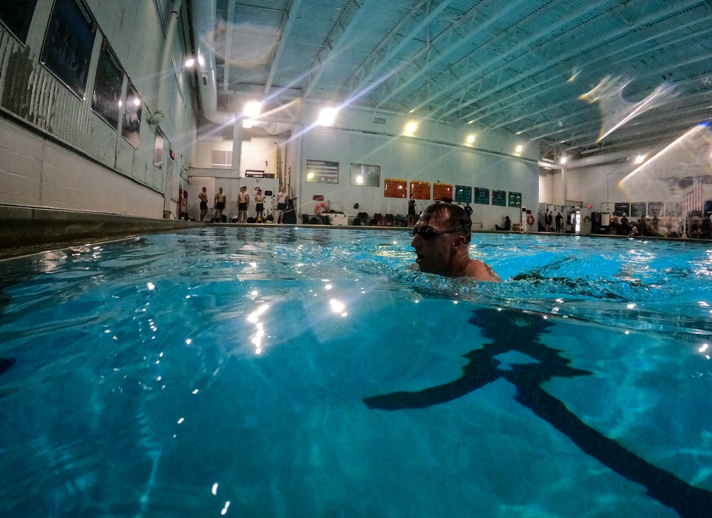 U.S. Marines compete in a swimming event during the 2024 fittest instructor event