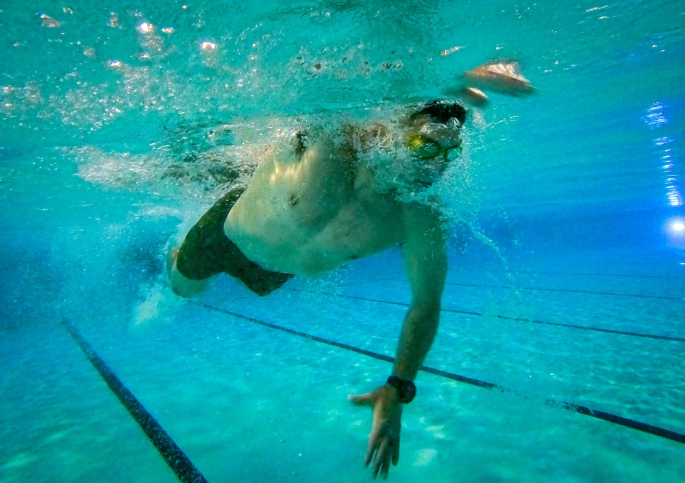 U.S. Marines compete in a swimming event during the 2024 fittest instructor event