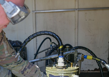 Barnes Airman makes crucial detection in oil, receives inspector general coin