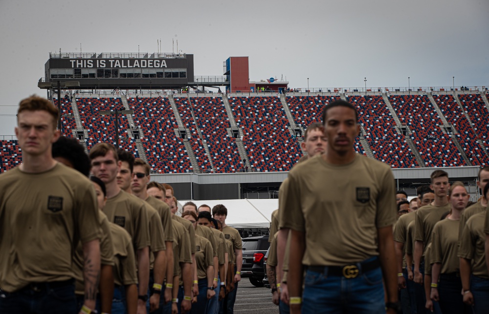 Chief of the National Guard Bureau swears in new recruits at the Talladega Superspeedway