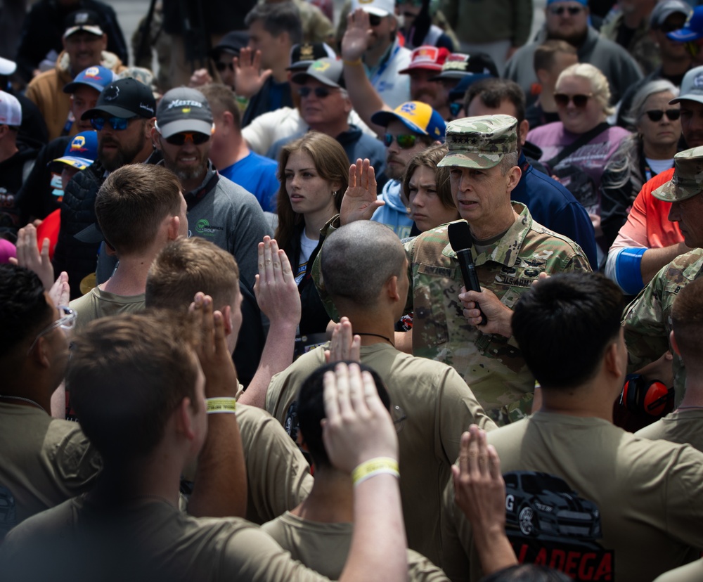 Chief of the National Guard Bureau swears in new recruits at the Talladega Superspeedway